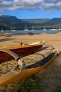 An outrigger canoe is ashore Royalty Free Stock Photo