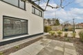 a side view of a house with a large window Royalty Free Stock Photo