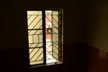 Outside day light through a partially closed window Royalty Free Stock Photo