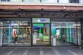 Outside facade for KPN high street shop store showing open entrance with company logo and sign