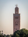 Outside the famous minaret of the Koutoubia mosque in Marrakech, Morocco Royalty Free Stock Photo