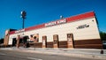 Outside a fast-food Burger King restaurant with a sleek, contemporary futuristic industrial look includes brick cladding