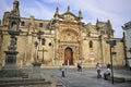 Outside of the Priory Church with incidental people