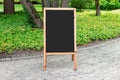 Outside sandwich wooden chalk board with blank black surface
