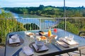 Outside served colorful breakfast table at the patio area Royalty Free Stock Photo