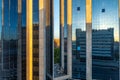 an outside shot of the city reflecting in buildings that are also reflected on the glass Royalty Free Stock Photo