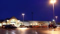 Outside shot of Safeway store at raining night