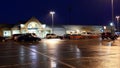 Outside shot of Safeway store at raining night