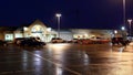 Outside shot of Safeway store at raining night