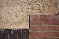 Outside wall, plaster and bricks Royalty Free Stock Photo
