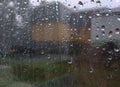 Outside the window is raining heavily, raindrops on the window