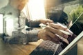 Outsource Developer working on marble Desk Working Laptop Computer Mobile Application Software and digital tablet dock smart