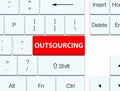 Outsourcing red keyboard button Royalty Free Stock Photo