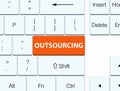 Outsourcing orange keyboard button Royalty Free Stock Photo