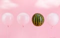 Outstanding balloon watermelon concept on a pastel pink background