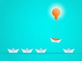 Outstanding the Boat rises above with light bulb idea. Business advantage opportunities