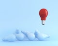 Outstanding light bulbs red in air one different idea from the others on blue pastel background Royalty Free Stock Photo