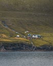 Outstanding panorama of Faroese Island cliffs and ocean mirror. Eysturoy, Faroe Islands, Denmark.