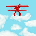 Outstanding Red Plane flying over clouds from the most dominant