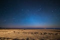 Outstanding starry sky at high altitude on the barren highlands of the Andes in Bolivia. Football ground soccer field in the mid