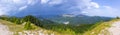 Outstanding view of Ialomita Valley and Bucegi Mountains, during a storm, from Podu cu Florile