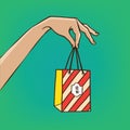 Outstretched hand with gift bag