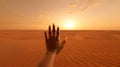 Outstretched hand reaching toward the setting sun in vast desert landscape Royalty Free Stock Photo
