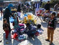 Unidentified Afghan Woman buying Clothes at Farmers Market in Ovakent, Hatay, Turkey