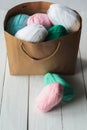 Oval acrylic wool yarn thread skeins with kraft package Royalty Free Stock Photo