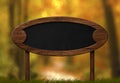 Oval blackboard sign autumn forest background