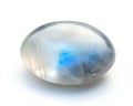 Moonstone ovalcut gem with subtle glow on white background rule Royalty Free Stock Photo