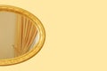 Oval empty wooden and gold gilded frame Royalty Free Stock Photo