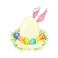 Oval Frame with Peeped out Bunny Ears and Decorated Easter Eggs or Paschal Eggs Rested in Green Grass Nest with Ribbon
