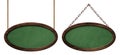 Oval green blackboard with dark wooden frame hanging on ropes and chains