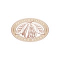 Oval label with cocoa beans. Premium quality emblem with cocoa branch.