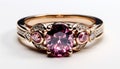 an oval pink ruby solitaire ring on white background Royalty Free Stock Photo