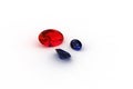 Oval Red Ruby and Pair of Sapphire Gemstones