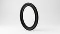 Oval shaped black frame suspended against a plain white background Royalty Free Stock Photo