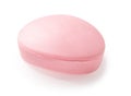 Oval shaped pink bar of soap isolated on a white background. Ellipse floral fragrance soap bar cutout for skin care face and body