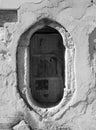 Oval window in a white wall Royalty Free Stock Photo