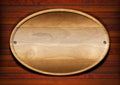 Oval Wood Board on Wall Royalty Free Stock Photo