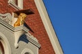 Golden lion sculpture at the facade of the former restaurant `zum goldenen LÃÂ¶wen` in OvelgÃÂ¶nne, Germany Royalty Free Stock Photo