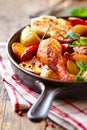 Oven-baked chicken with vegetables and fresh herbs. Royalty Free Stock Photo