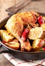 Oven-baked chicken with vegetables and fresh herbs. Homemade food. Symbolic Royalty Free Stock Photo