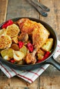 Oven-baked chicken with vegetables and fresh herbs. Royalty Free Stock Photo