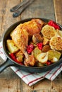 Oven-baked chicken with vegetables and fresh herbs. Royalty Free Stock Photo