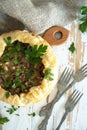 Oven baked meat pie with feta cheese, parsley and green peas Royalty Free Stock Photo