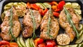 Oven baked pork entrecotes with bell pepper and zucchini.