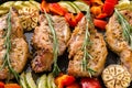 Oven baked pork entrecotes with bell pepper and zucchini.