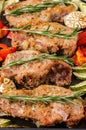 Oven baked pork entrecotes with bell pepper and zucchini.